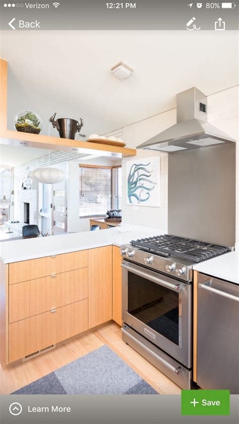All of their cabinets are handmade using the highest quality wood. What type of wood cabinet for mid century kitchen?