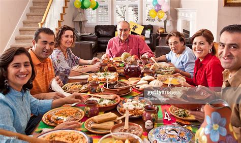 The typical mexican traditions for thanksgiving are whatever one normally does on a jueves in late noviembre, probably go to work and then do whatever one normally does after work. Multigenerational Mexican Family Celebrates Dinner High-Res Stock Photo - Getty Images