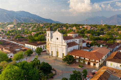 Aerial View Of The Church Of Santa Fé De Antioquia With A Mountain In