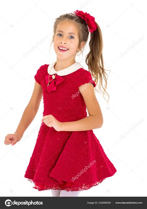 Little Girl Posing In The Studio Close Up Stock Photo By ©lotosfoto1