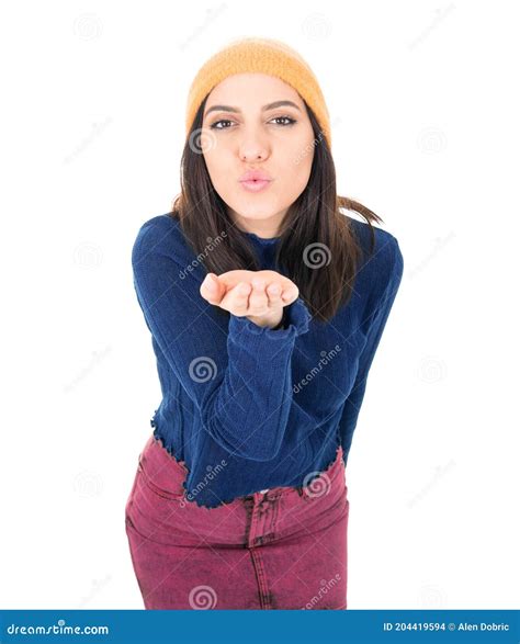 Cute Young Girl Blows A Kiss To You From His Palm Isolated On White