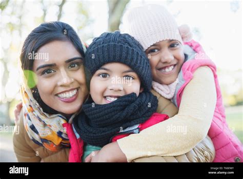 Portrait Happy Mother And Children Hugging Stock Photo Alamy