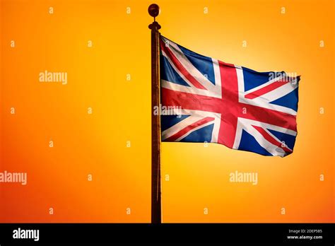 United Kingdom Flag Flag Waving With Sunrise Stock Photo Alamy