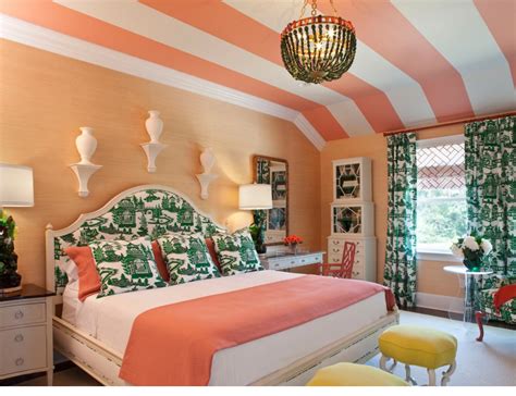 Orange walls, patterned artwork and light carpets add to the perceived space of the barrington design's living room. I love the peach walls, the light floor, the coral and ...