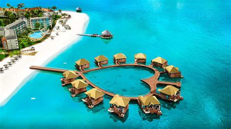 Jamaican Resort Has Over The Water Bungalows With Glass Floors