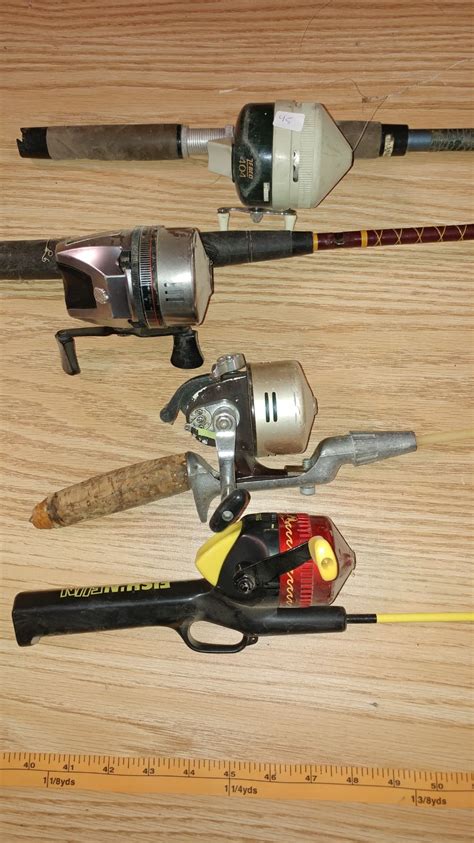 Lot Of Four Fishing Rods Various Lengths
