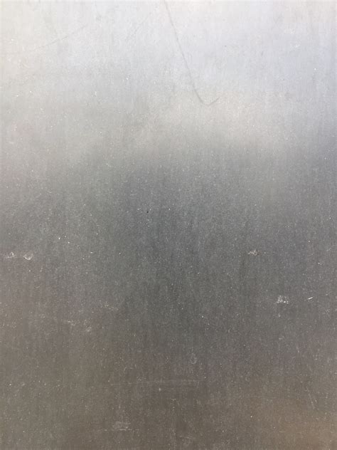 Metallic Grey Plastic With Scratches And Grunge Free Textures
