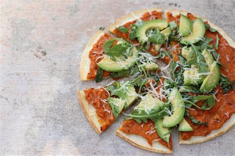 I followed the directions on the box for cooking: Trader Joe's cauliflower crust pizza recipes | Well+Good