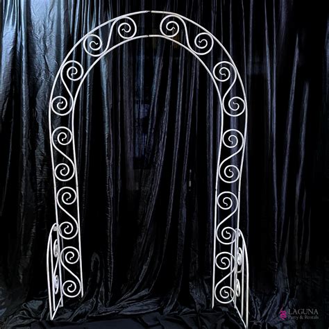 White Metal Arch Laguna Party And Rentals