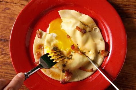 egg yolk ravioli uova da raviolo with bacon sage sauce recipes to impress guests pictures