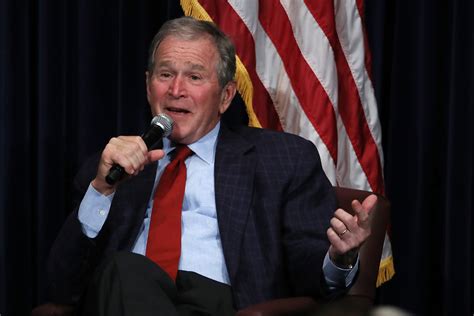 George W. Bush warns against 'isolationist tendency'