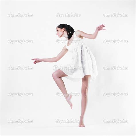 Beautiful Woman Dancing And Wearing A Light White Dress — Stock Photo