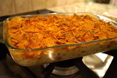 In a 13x9 inch pan or large casserole dish, start by putting 1/3 of the bag of doritos into the bottom of your casserole dish. Mexican Chicken Casserole | Food, Mexican chicken recipes ...