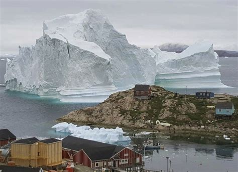 Greenland Village Watches Looming Iceberg Weather Forecast