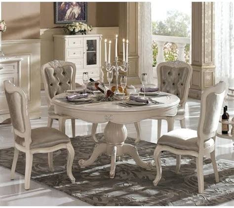 This beautiful round dining table with antique oak finish pairs perfectly with any reclaimed wood or mixed media dining room decor. Image result for round dining table french | French ...