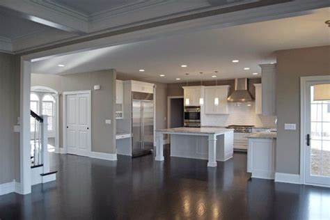Dark counter tops taupe walls white cabinets and trim stainless steel