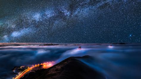 The sky is so dark that an astronaut hiding from sunlight . Clouds Covered Mountain Under Black Sky Full Of Stars ...