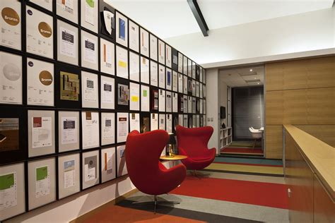 Best Design Awards certificates on display | Display wall design, Award