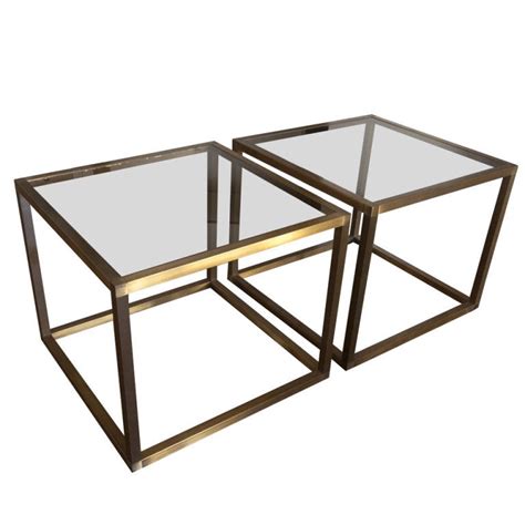 Coffee tables come in a variety of materials and shapes. Pair Smoked Glass And Brass Open Cube Tables at 1stdibs