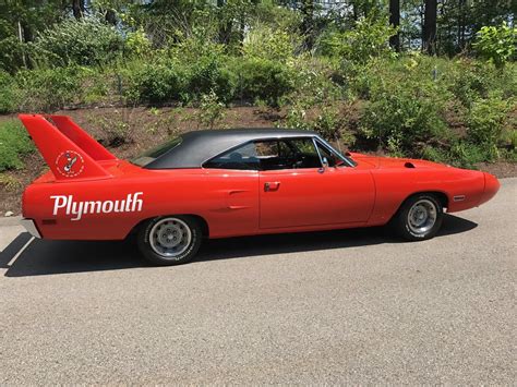 Park the two cars next to each other and the differences are obvious. 1970 Plymouth Superbird | Classic Motorcars