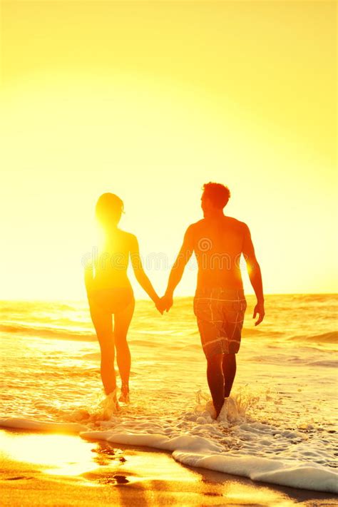 beach couple holding hands together at sunset stock image image of colourful love 54572087