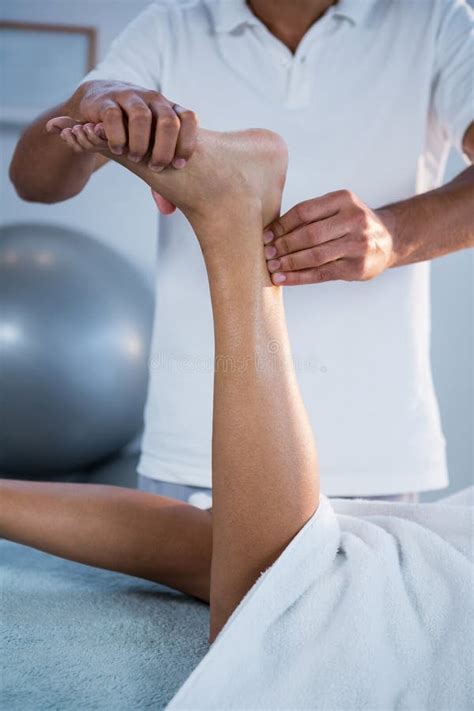 Woman Receiving Foot Massage From Physiotherapist Stock Image Image