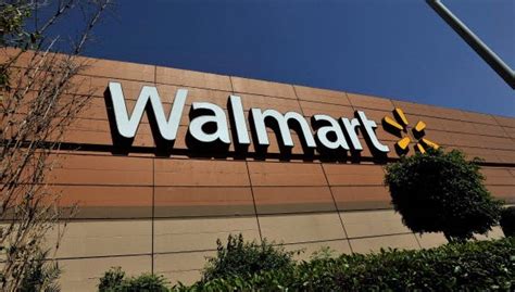 Wal Mart Shares Fall Slashes Outlook