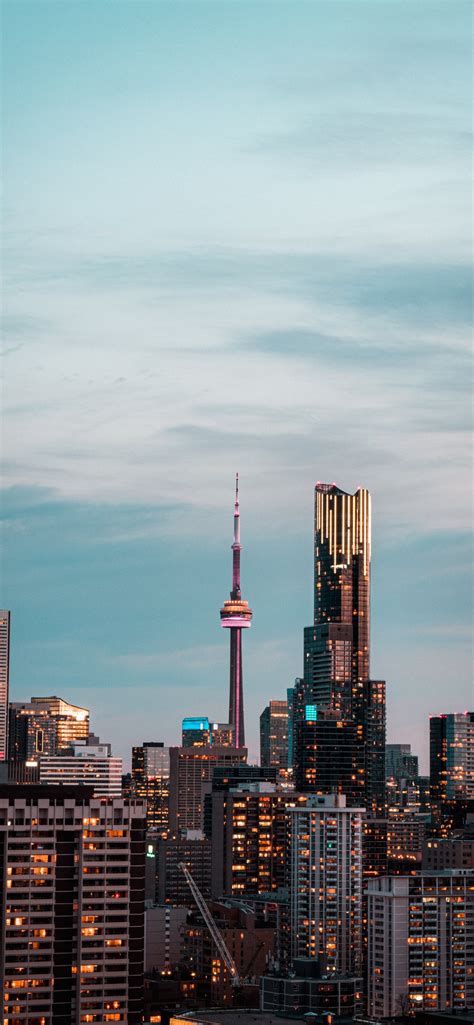 City Skyline Under Gray Cloudy Sky During Daytime Iphone 11 Wallpapers