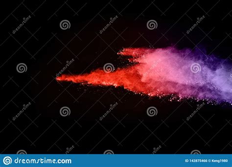 Abstract Colored Dust Explosion On A Black Background Stock Photo