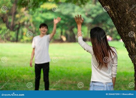 People Greeting Or Saying Goodbye By Waving Hands Stock Photo Image