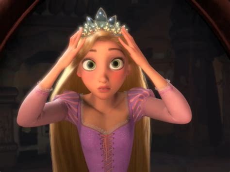 Rapunzel is 18 years old during the film. Rapunzel trying on her tiara - Disney Princess Photo ...