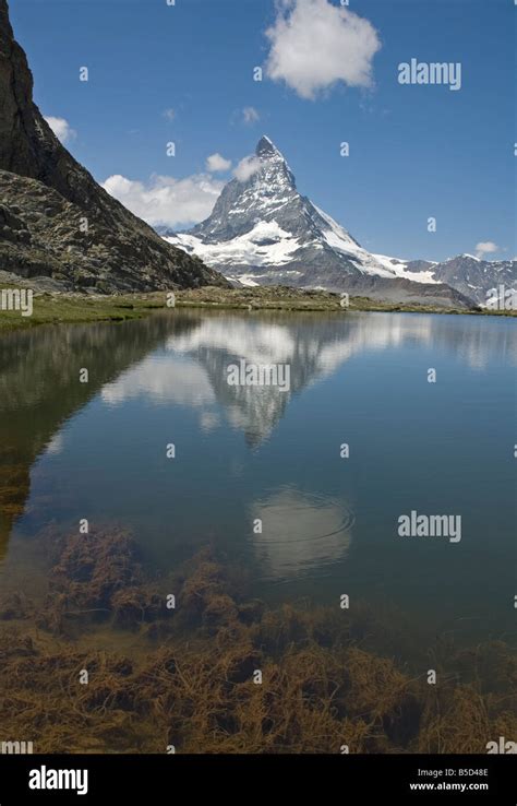 Small Lake The Riffelsee High Above Zermatt With The Mighty
