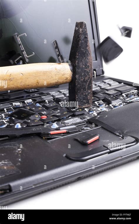 Man Smashing Computer With Hammer Hi Res Stock Photography And Images