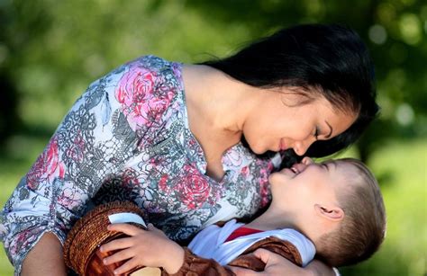 Mother Hugging Her Son Free Image Download