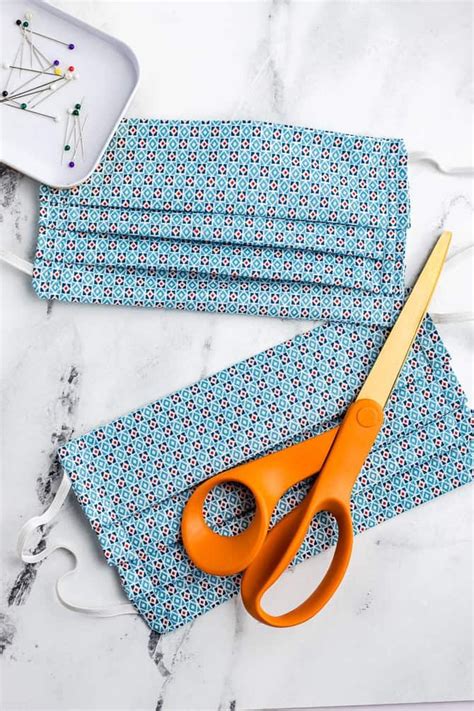 I like to use my iron (without steam) to set the crease. A free pattern for a DIY fabric face mask to sew for ...