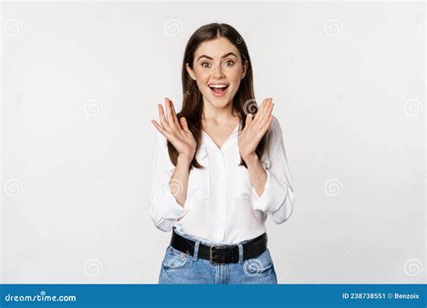 enthusiastic laughing woman smiling amused clapping hands applausing standing in formal