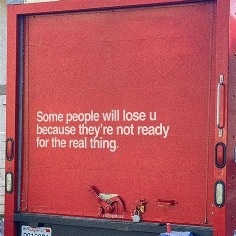 A Red Box Truck With Some Writing On Its Side And The Words People