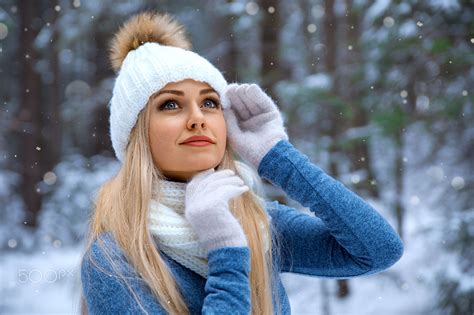 4504174 depth of field women outdoors snow blonde women sweater blue eyes portrait