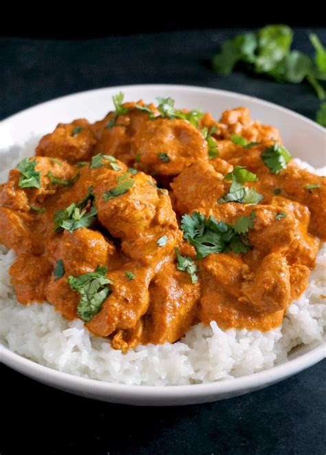 Add in the chicken and stir into the spices. Butter chicken recipe Indian style
