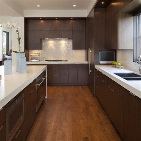 Dark walnut is slightly lighter than jacobean and if you feel jacobean is still too dark for your tastes i see some doing dark cabinets and natural floors with bona traffic (as this tones down the. http://www.pmsilver.com/wp-content/uploads/2016/06/Modern-Kitchen-Design-applied-Solid-Wood ...