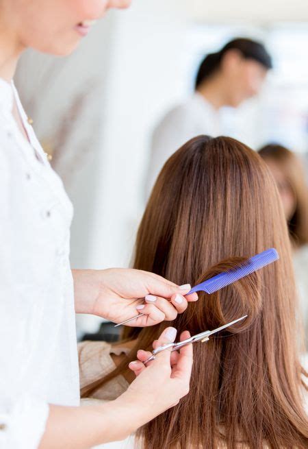 Woman Getting A Haircut At The Beauty Salon Freestock Photos