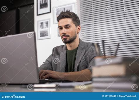 Concentrated Guy Working In Office Stock Photo Image Of Peaceful
