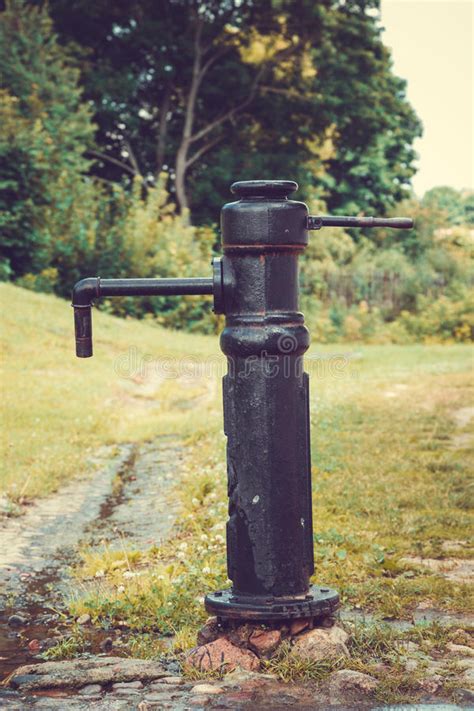 Fountains with antique manual water pumps. Retro Drinking Water Fountain With Hand Pump . Stock Image ...
