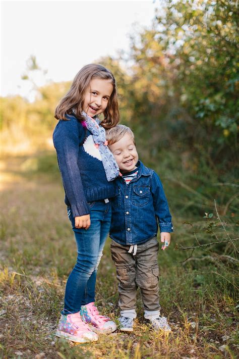 Beautiful Brother And Sister Holding Each Other By Stocksy Contributor Jakob Lagerstedt