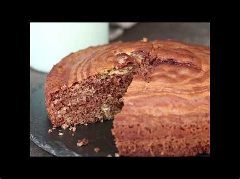 How to bake a cake using a jiko and sufuria. Mawe Tatu Cake - YouTube