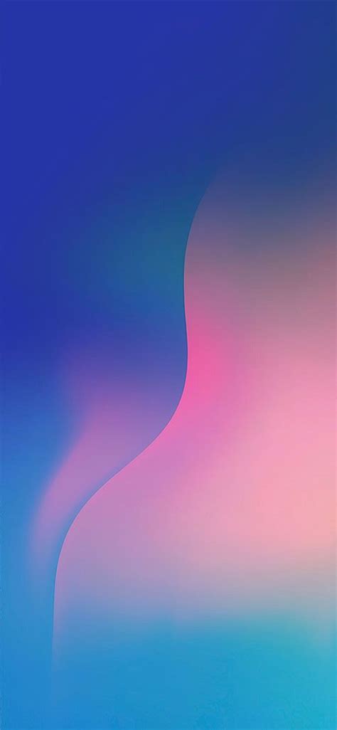 An Abstract Blue And Pink Background With Some Blurry Lines On The