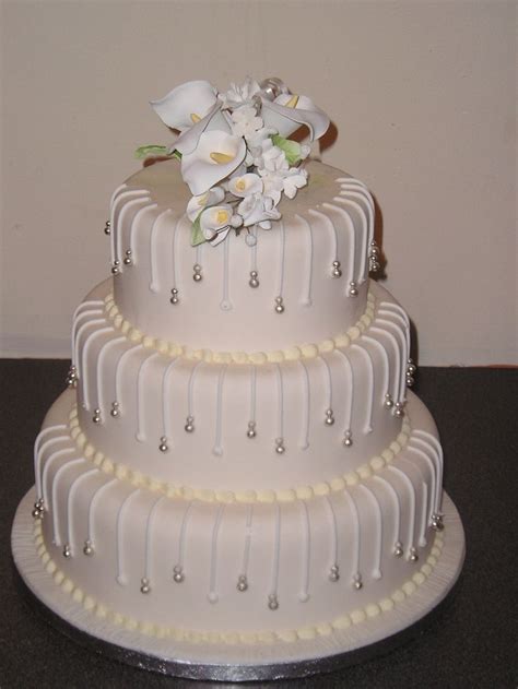 Browse 1000s of latest bridal photos, lehenga & jewelry designs, decor ideas, etc. 3 Tier Wedding Cake Designs - Wedding and Bridal Inspiration