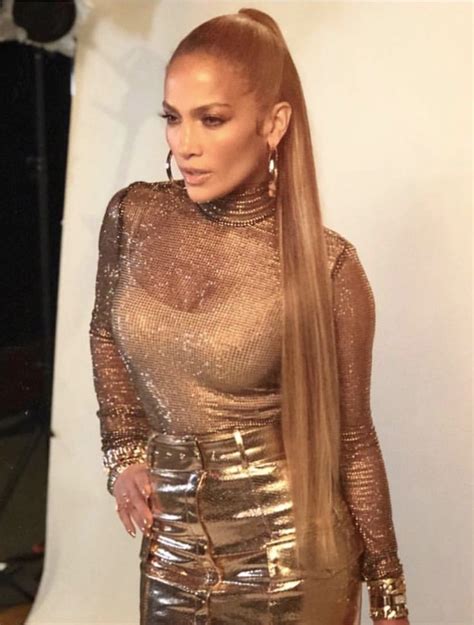 Jennifer Lopez With Extra Long Straight Hair And Gold Shiny Outfit