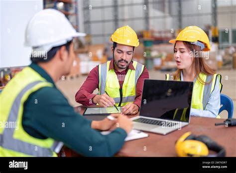 Group of worker in the warehouse factory conduct toolbox talk daily