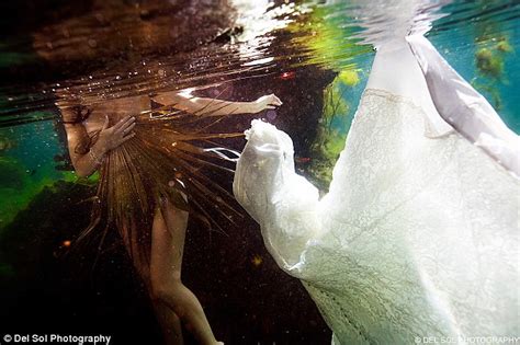Newlyweds Take The Plunge In Bizarre Trend For Underwater Wedding